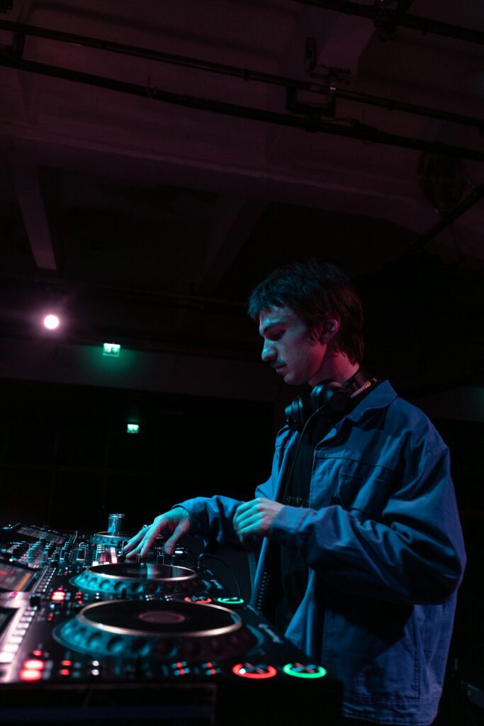 Illustrative image of a young DJ using professional decks for a Macclesfield music project